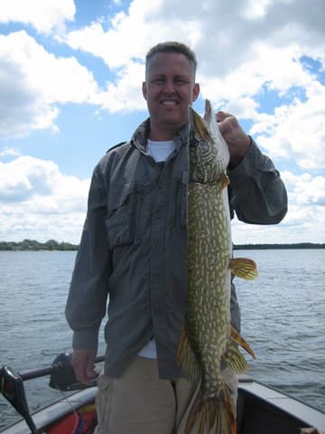 Pike fishing on a calm lake