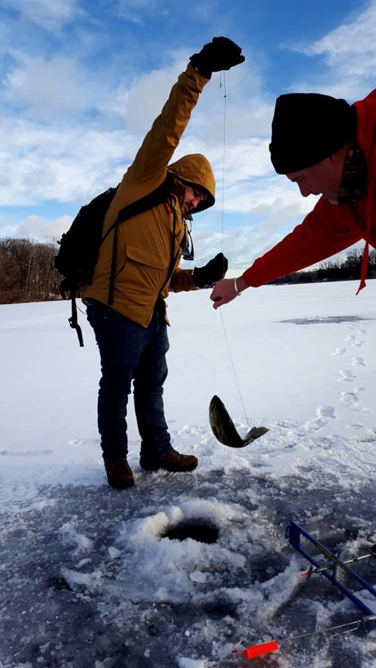 Bass coming out of the ice hole