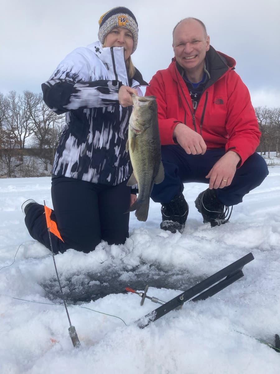 Craig with bass caught on a tip-up