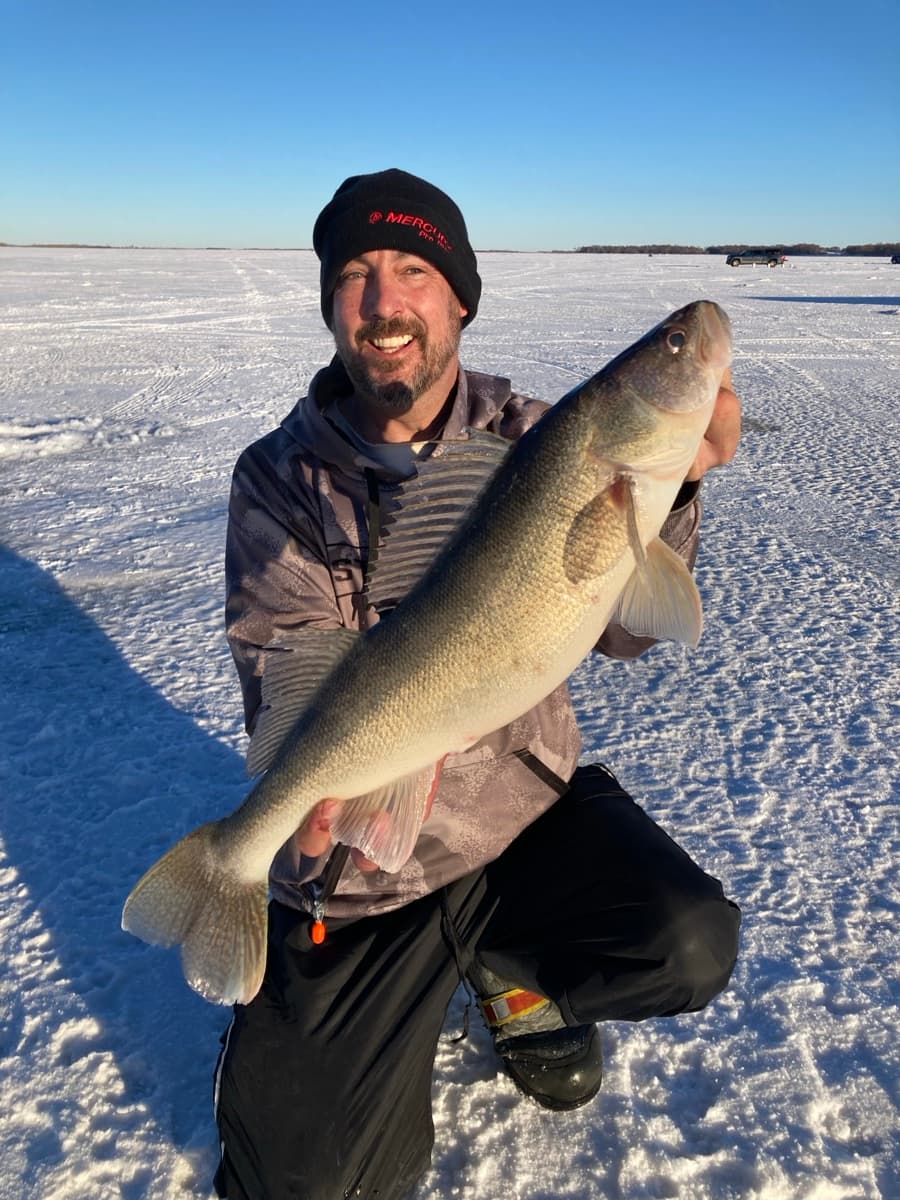 Scott with a big walleye on the ice