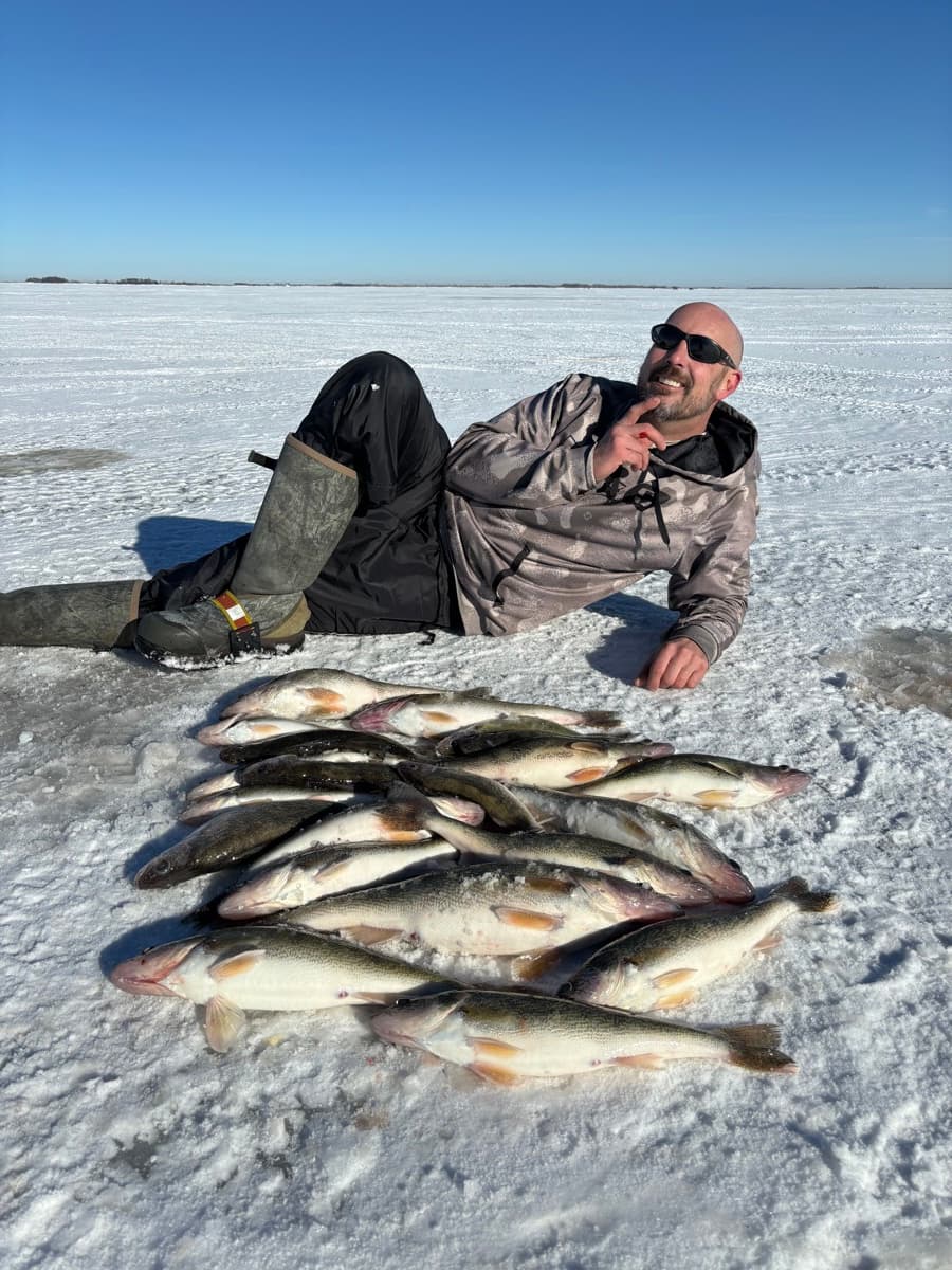 Scott having fun with walleyes on the ice